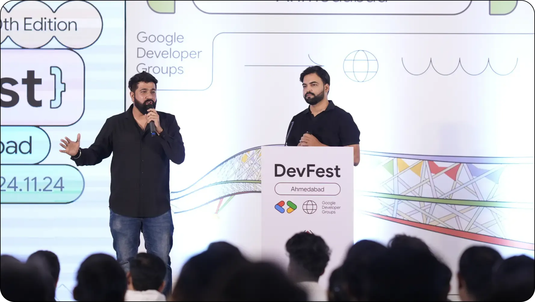 Karan Chugh and Ashish Chawla addressing the audience at GDG DevFest Ahmedabad