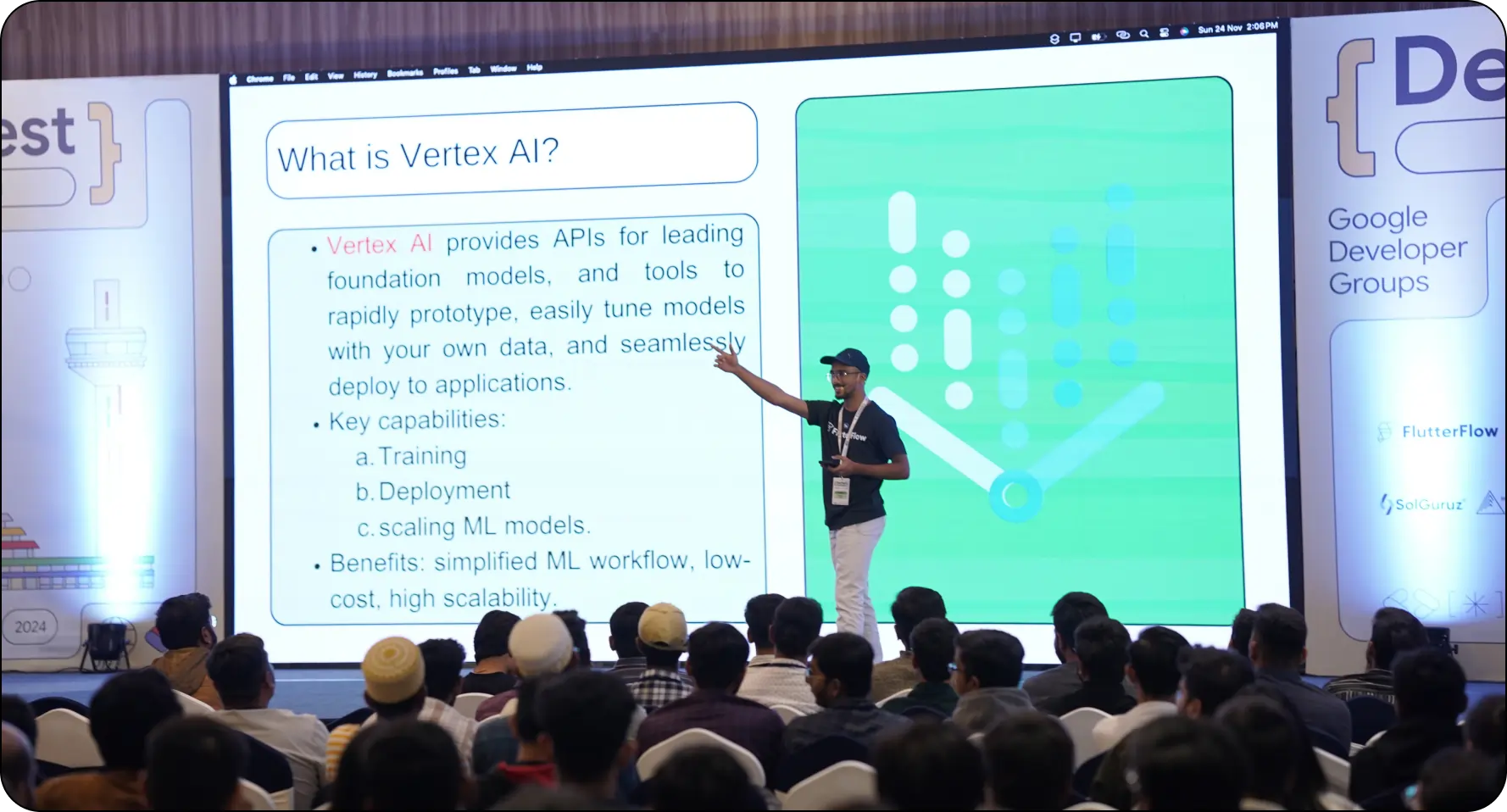 Speaker presenting "What is Vertex AI?" at GDG DevFest Ahmedabad